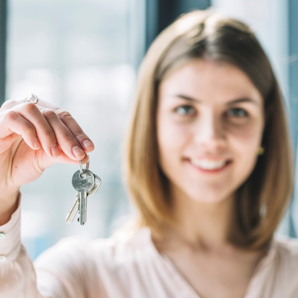 blurred-woman-showing-keys